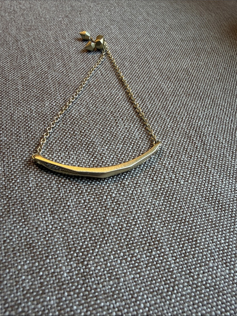 Kendra Scott Gold Curved Bar Bracelet with Polished Finish